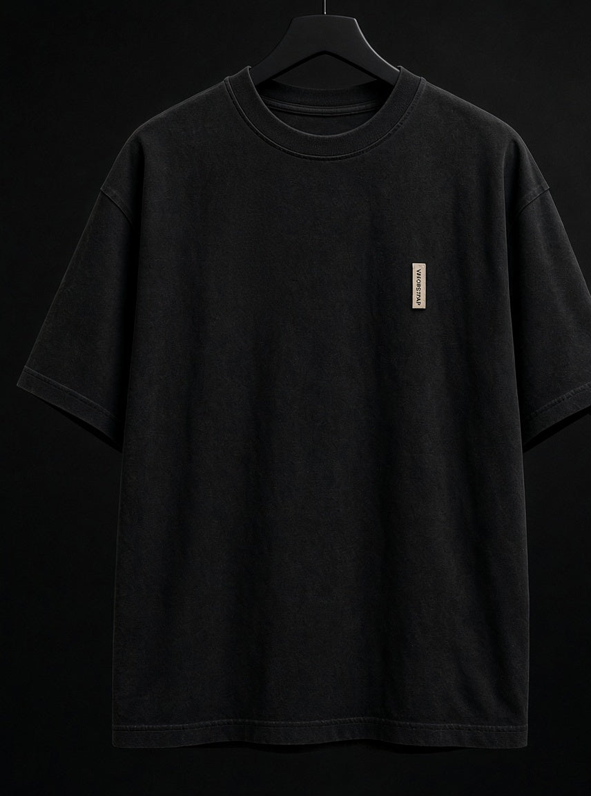 Looks Expensive – black heavyweight graphic t-shirt, front print, small VaporStrap chest logo
